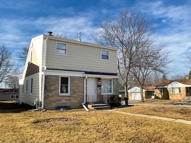 front facade with a front lawn and a storage unit