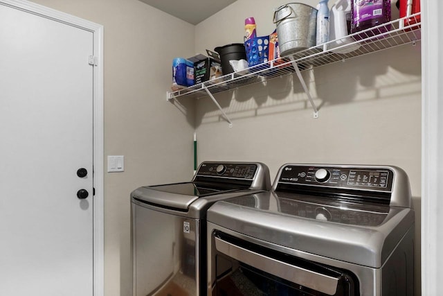 laundry area featuring washer and clothes dryer