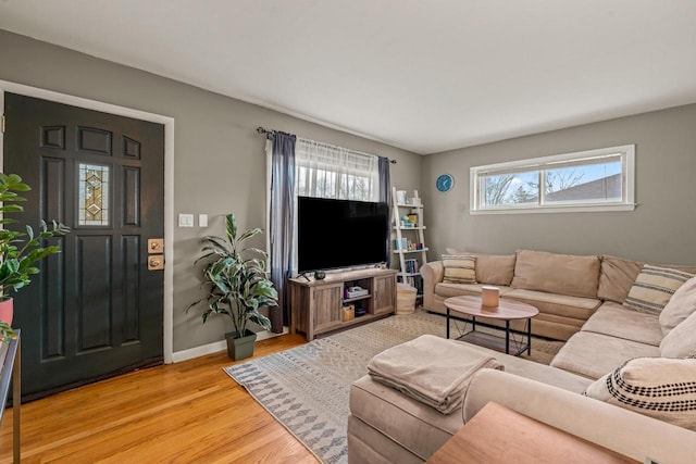 living room with light hardwood / wood-style floors