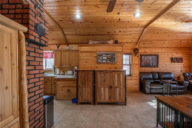 W268 County Highway A, Stone Lake, WI 54876 - kitchen with light tile patterned flooring, beamed ceiling, wooden walls, and wooden ceiling