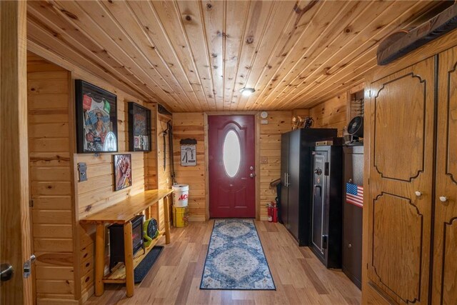 W268 County Highway A, Stone Lake, WI 54876 - entrance foyer with wooden walls, light hardwood / wood-style floors, and wooden ceiling