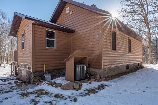 W268 County Highway A, Stone Lake, WI 54876 - view of snowy exterior featuring central air condition unit