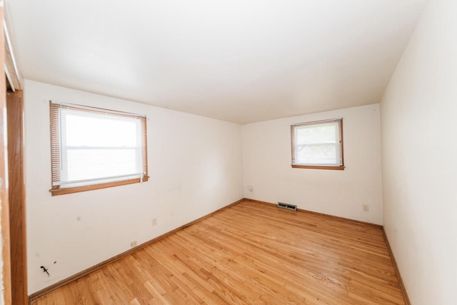 empty room featuring light wood-type flooring