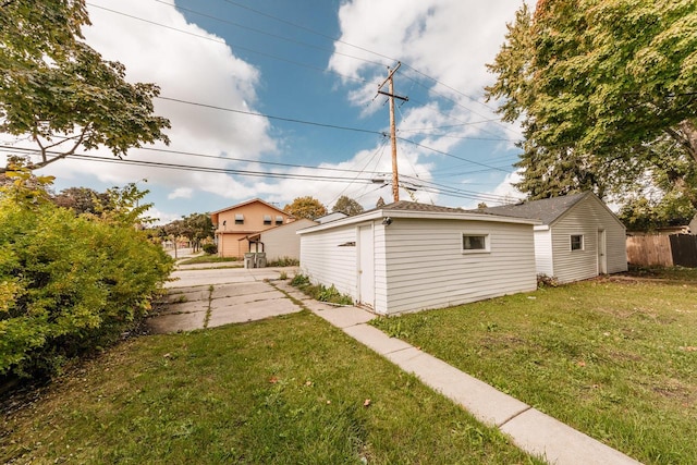 view of side of home featuring a yard