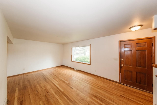 entrance foyer with light wood-type flooring