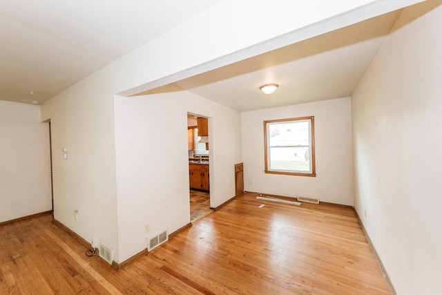 empty room featuring light hardwood / wood-style floors