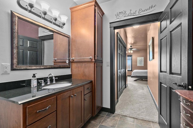 bathroom with vanity, tile patterned floors, and ceiling fan