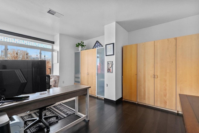 office space featuring dark hardwood / wood-style flooring