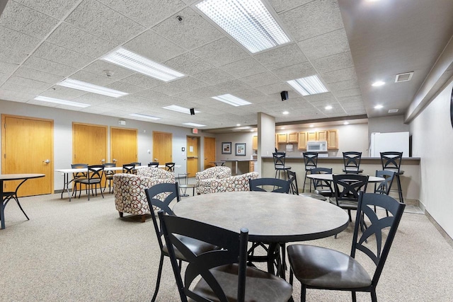 view of carpeted dining area