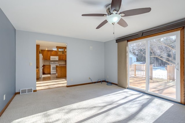 401 E Riverside Ave, Merrill, WI 54452 - unfurnished living room featuring light carpet