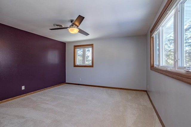 401 E Riverside Ave, Merrill, WI 54452 - carpeted spare room featuring ceiling fan