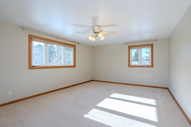 401 E Riverside Ave, Merrill, WI 54452 - carpeted empty room featuring ceiling fan