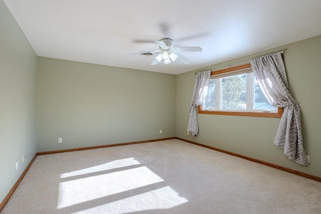 401 E Riverside Ave, Merrill, WI 54452 - unfurnished room with light carpet and ceiling fan
