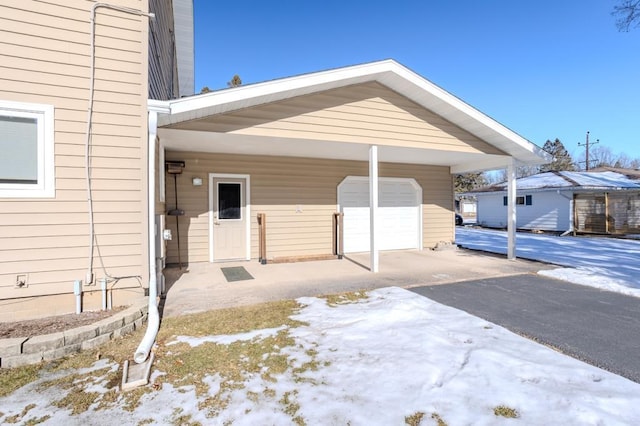 401 E Riverside Ave, Merrill, WI 54452 - exterior space with a garage