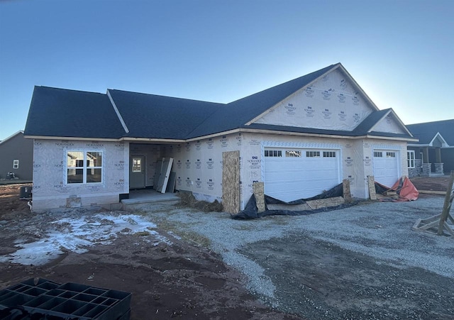 property in mid-construction featuring a garage