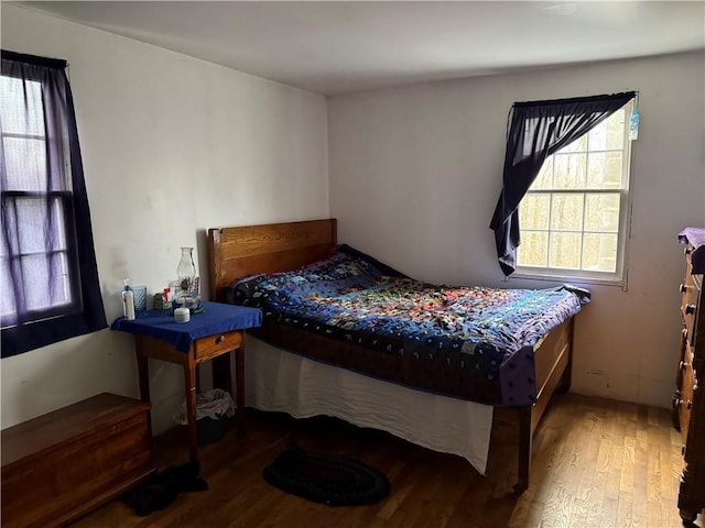 bedroom featuring hardwood / wood-style floors