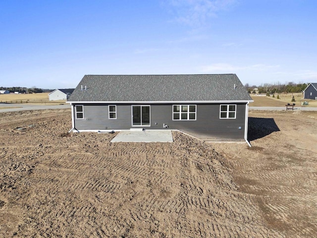 back of property featuring a patio area