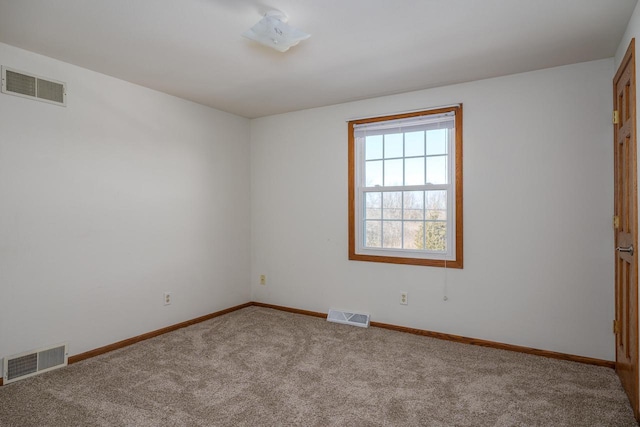 unfurnished room with carpet flooring