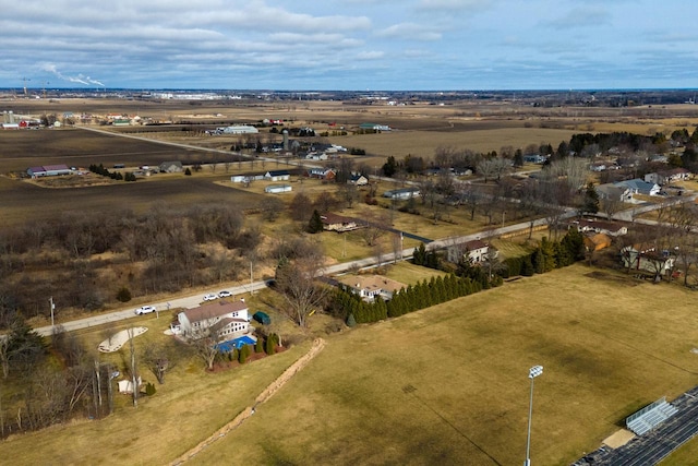 birds eye view of property featuring a rural view