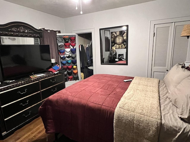 bedroom featuring wood-type flooring