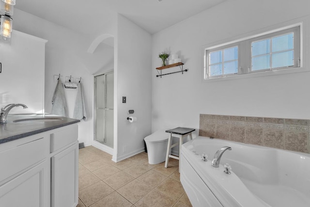 full bathroom with tile patterned floors, toilet, separate shower and tub, and vanity