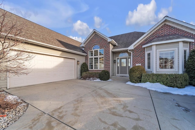 single story home with a garage