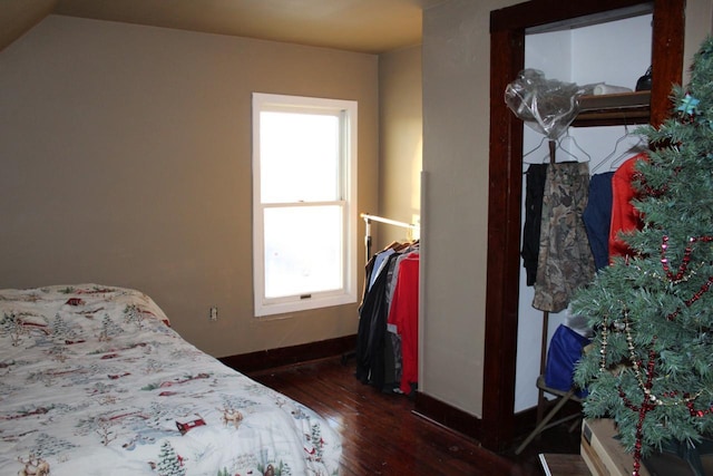 bedroom featuring dark hardwood / wood-style flooring