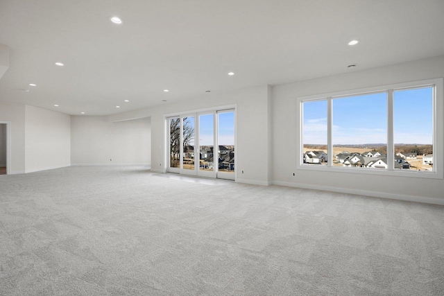 empty room with light colored carpet