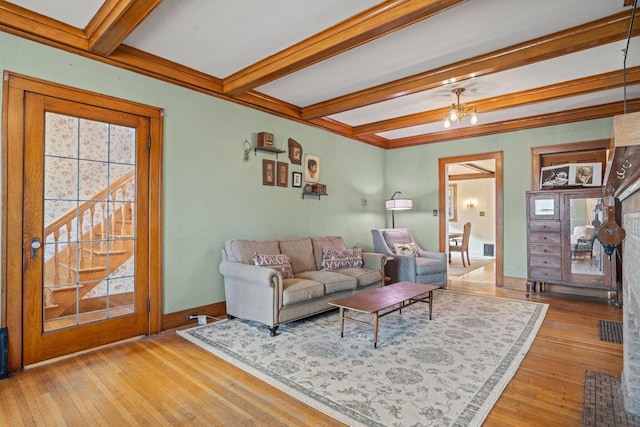 living room featuring wood-type flooring and beam ceiling