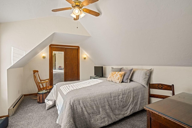 carpeted bedroom with a baseboard radiator, ceiling fan, and vaulted ceiling