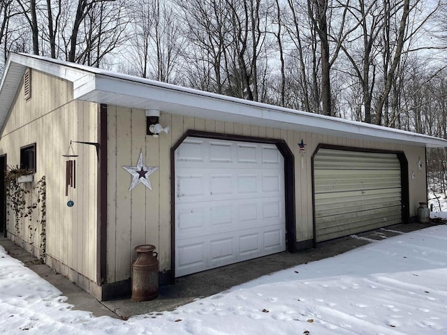 view of snow covered garage