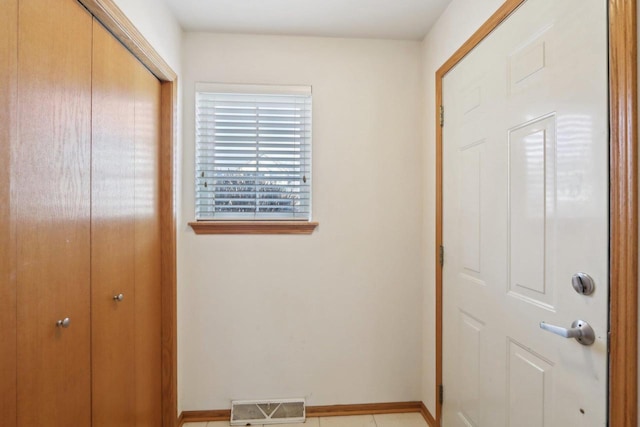 interior space with visible vents and baseboards