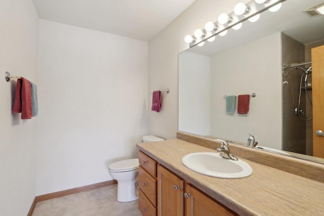 full bath featuring visible vents, baseboards, walk in shower, toilet, and vanity