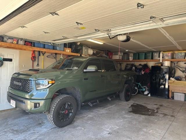 garage featuring a garage door opener