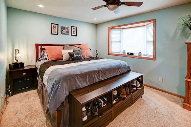 carpeted bedroom featuring ceiling fan