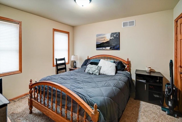 bedroom featuring carpet