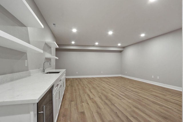 4675 98th St, Pleasant Prairie, WI 53158 - bar area with a sink, light wood-style floors, recessed lighting, and baseboards