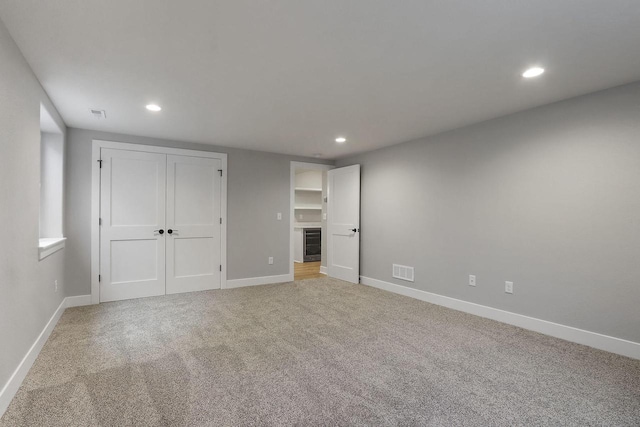 4675 98th St, Pleasant Prairie, WI 53158 - unfurnished bedroom with recessed lighting, light colored carpet, baseboards, and a closet