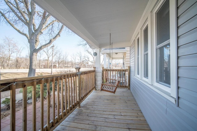 wooden deck featuring a porch