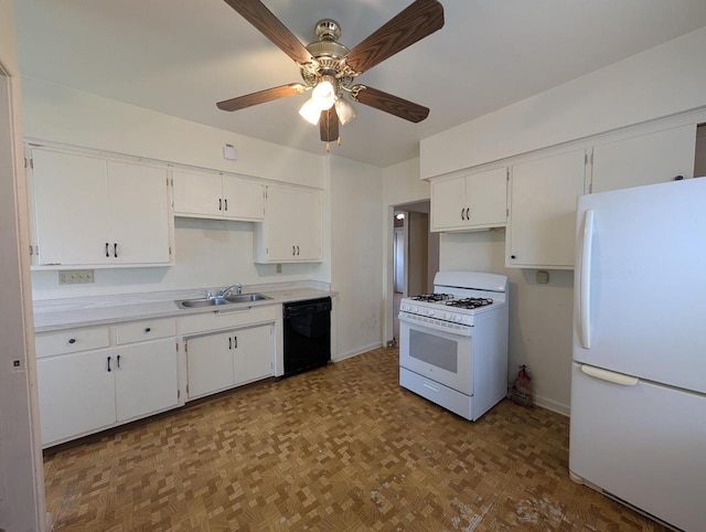 kitchen featuring sink, white appliances, light parquet floors, and white cabinets