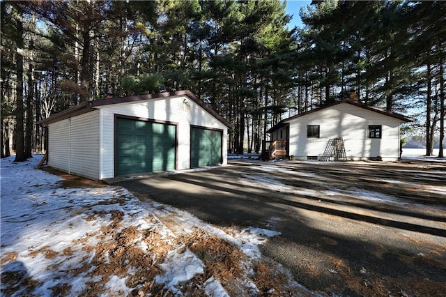 view of snow covered garage