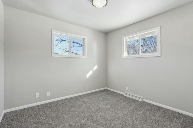 unfurnished room featuring carpet floors