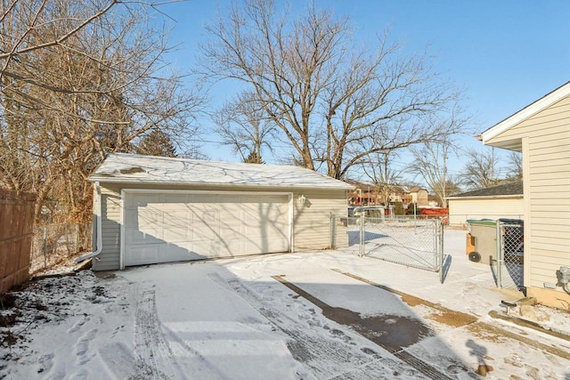 view of snow covered garage