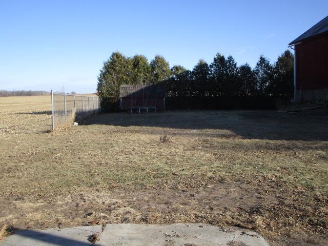 view of yard with a rural view