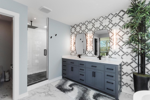 bathroom featuring vanity and an enclosed shower