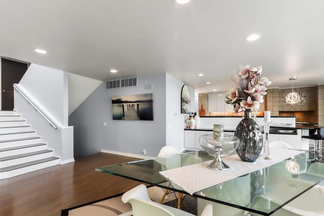 dining room featuring dark wood-type flooring