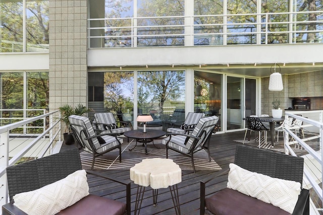 wooden deck with outdoor lounge area