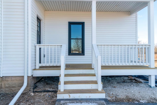 entrance to property with covered porch