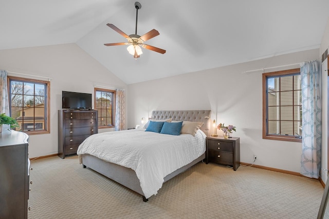 bedroom with lofted ceiling, light colored carpet, and ceiling fan