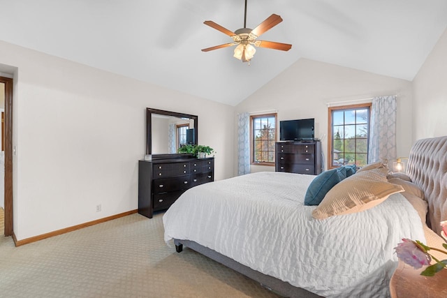 carpeted bedroom featuring vaulted ceiling and ceiling fan